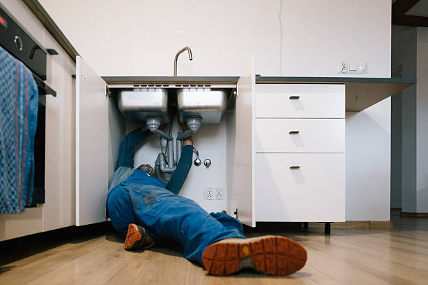 Professional Drain Cleaning technician working in Forestdale, AL